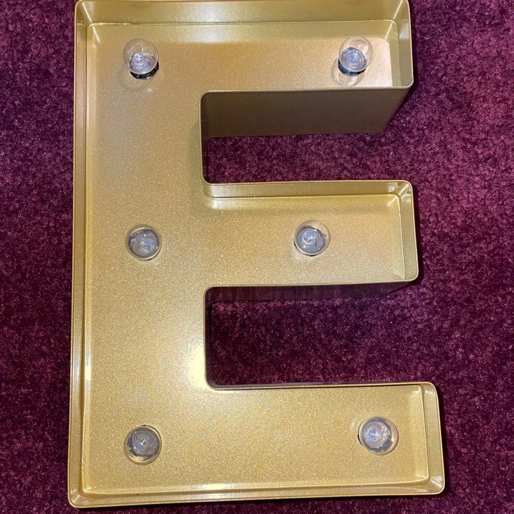 “E” wall emblem